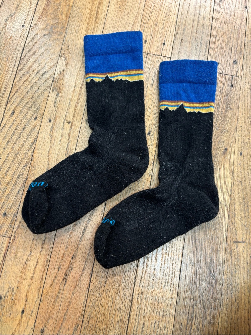 Patagonia Black Crew Socks with Blue Cuff and Mountain Stripe